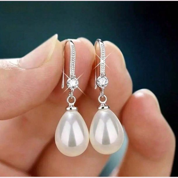 Smukke fine reringe med zirkonia sten og perle - Slv