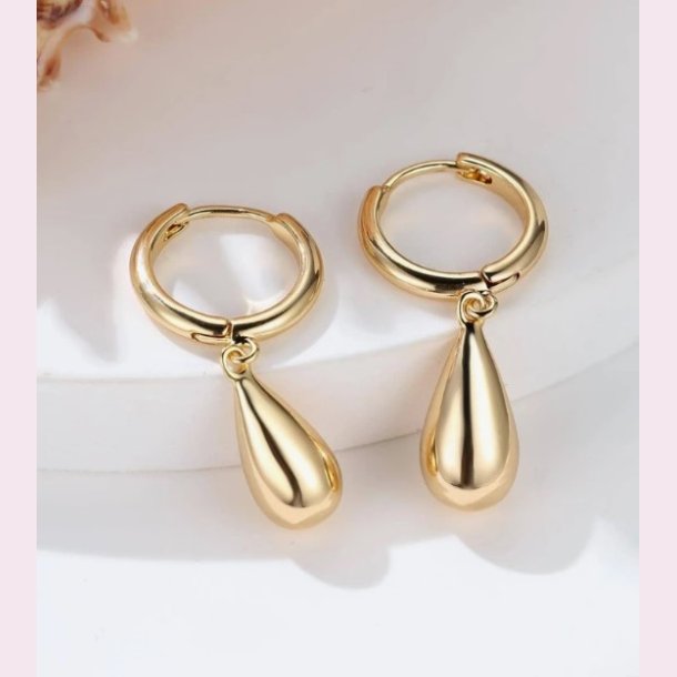 Forgyldt drbe formet reringe