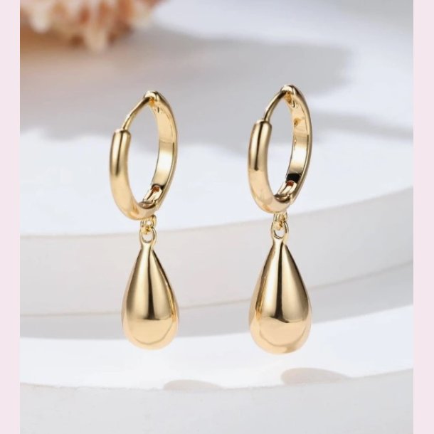 Forgyldt drbe formet reringe